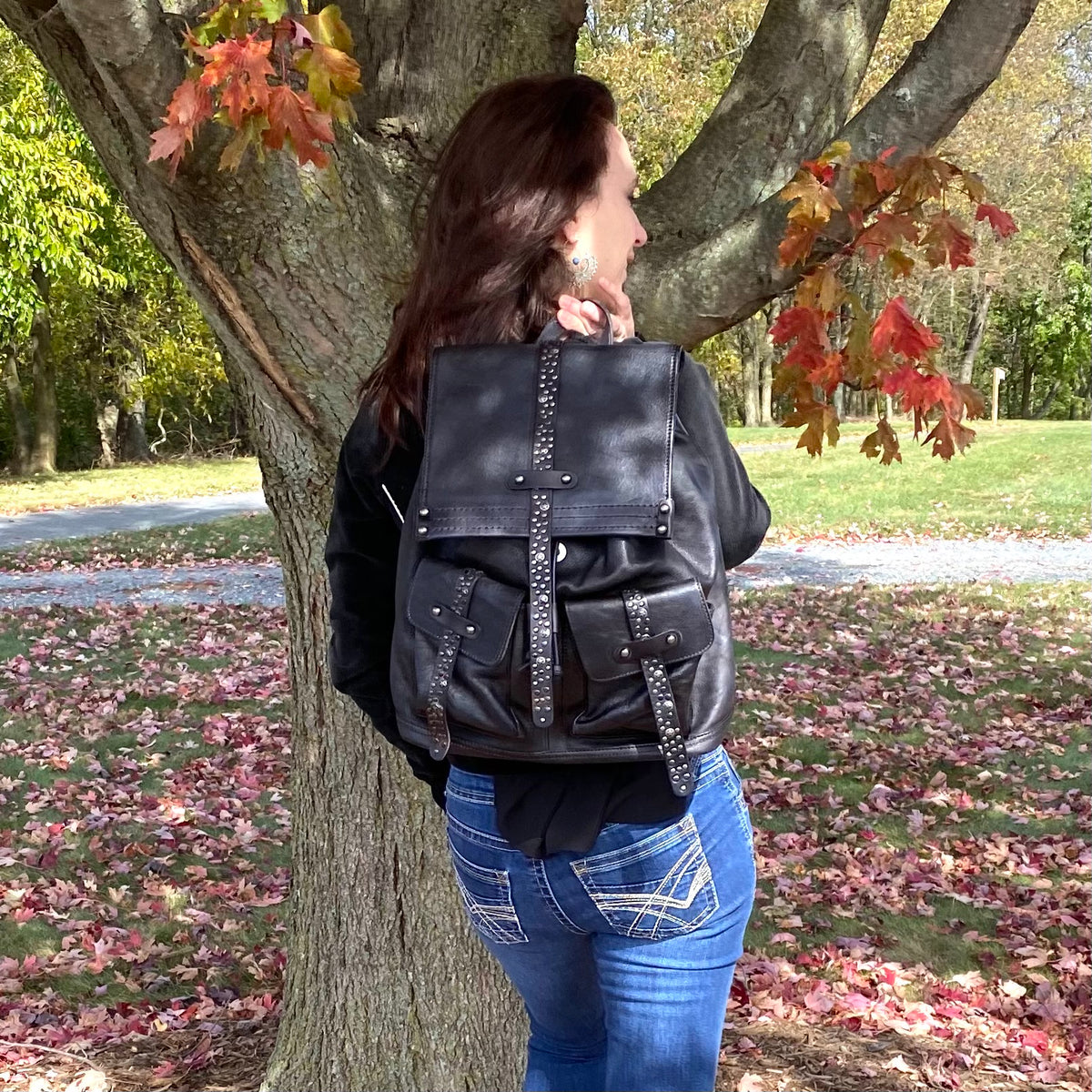 Leather best sale jacket backpack